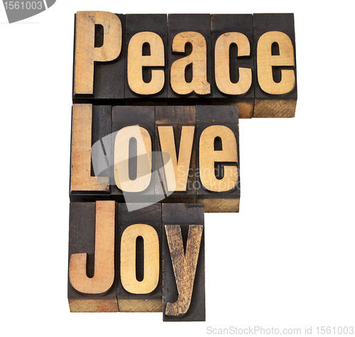 Image of peace, love and joy in letterpress