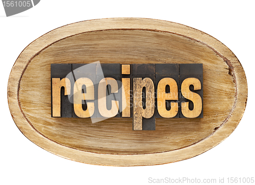 Image of recipes word in wooden bowl