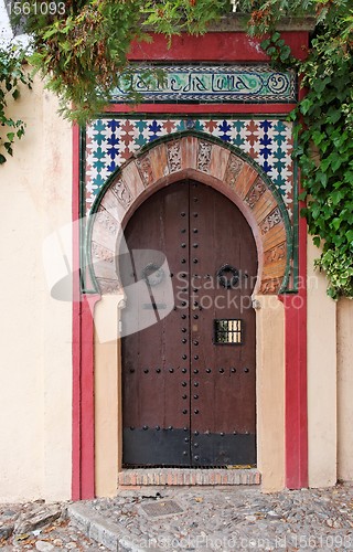 Image of Moorish style door of a house in Granada, Spain