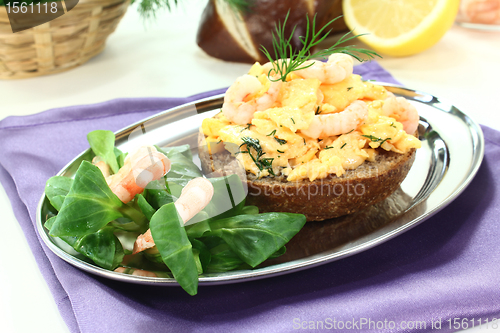 Image of Scrambled eggs with dill and shrimp
