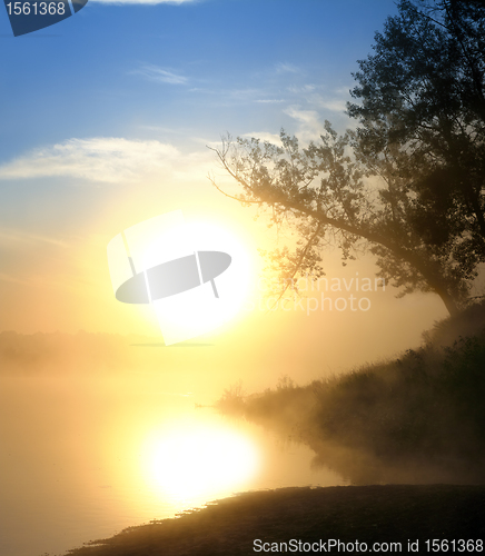 Image of beautiful fog sunrise on river