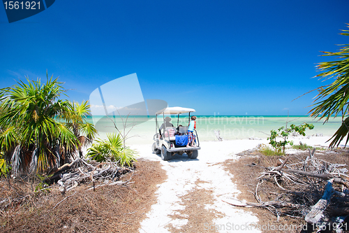 Image of Golf cart at tropical beach