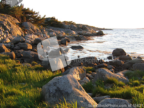 Image of Rocky bay at sunset