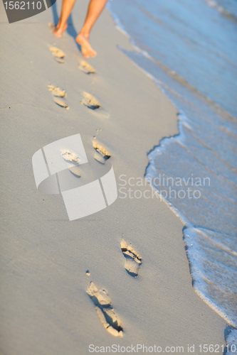 Image of Footprints on tropical beach