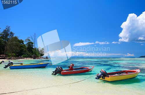 Image of Colorful boats at sea shore