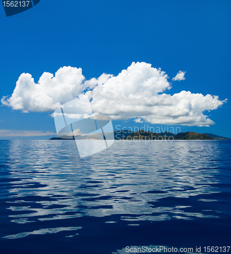 Image of Tropical island and big cloud