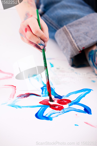 Image of Boy painting