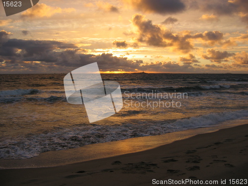 Image of Sunset at Orre beach with an isle in the horizon