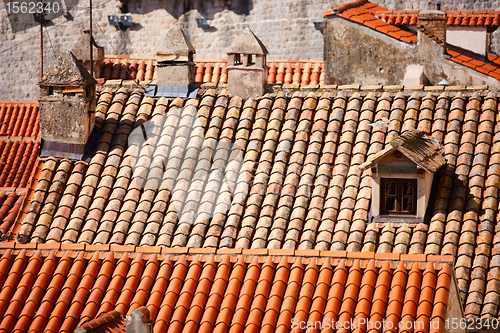 Image of Close up of red roof and tiles