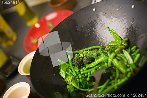 Image of Chef cooking wok