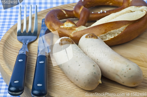 Image of veal sausage with pretzel