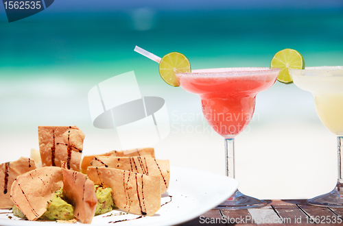 Image of Tortilla chips and margarita cocktails