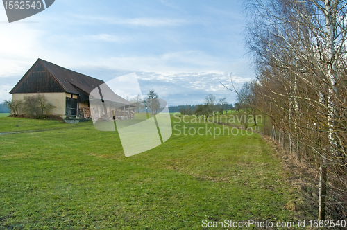 Image of barn with fuel wood