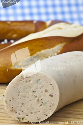 Image of veal sausage with pretzel