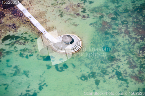 Image of Above view of long jetty in ocean