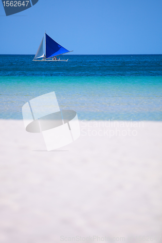 Image of White sand beach and boat