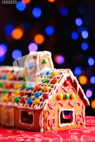 Image of Gingerbread house beautifully decorated with candies