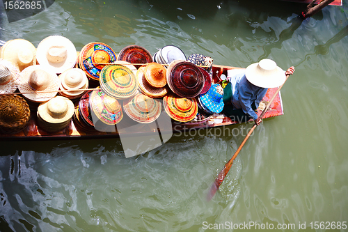 Image of Vendor on floating market in Thailand