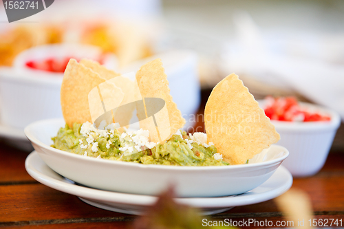 Image of Guacamole and tortilla chips