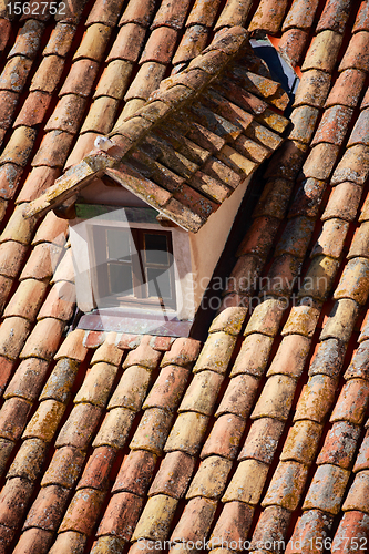 Image of Close up of red roof and tiles