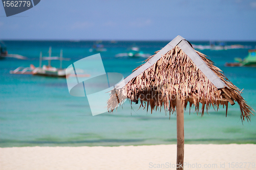 Image of Straw beach umbrella