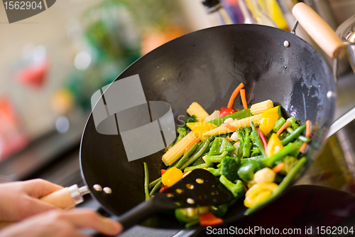 Image of Chef cooking wok