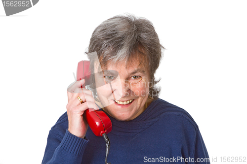 Image of Female senior with telephone receiver