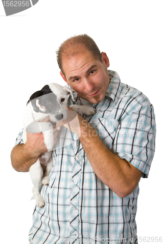 Image of Young man and his puppy