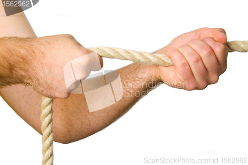 Image of Hands pull a rope