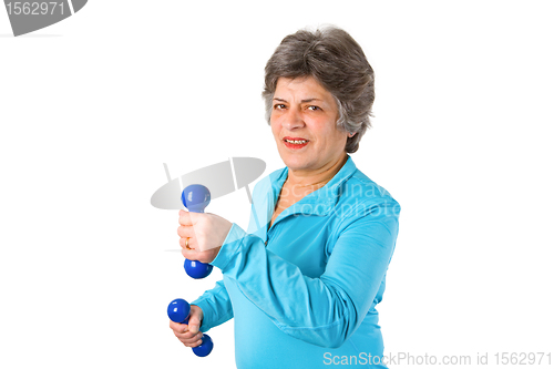 Image of Senior woman with barbells 