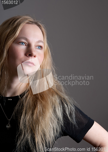 Image of Portrait of a young woman with long hair