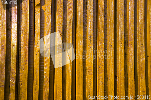 Image of yellow-painted wooden wall impeachment small board 