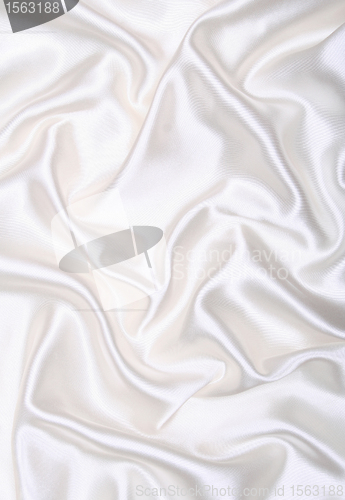 Image of Smooth elegant white silk as background 