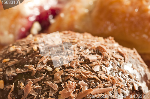 Image of Berliner with almond and chocolate slivers