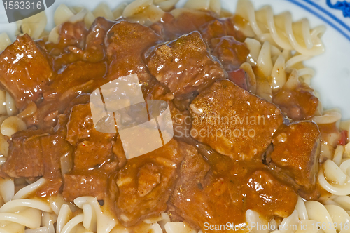 Image of goulash of beef,noodles