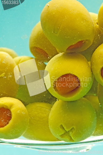 Image of olives filled with red paste