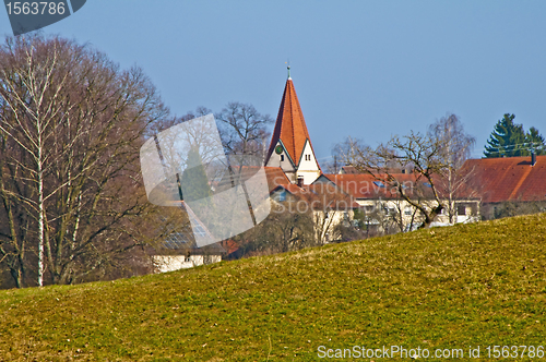 Image of  panoramic view to a small village with a church
