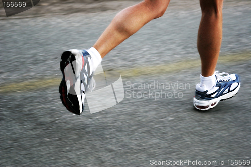 Image of Feet of a running woman