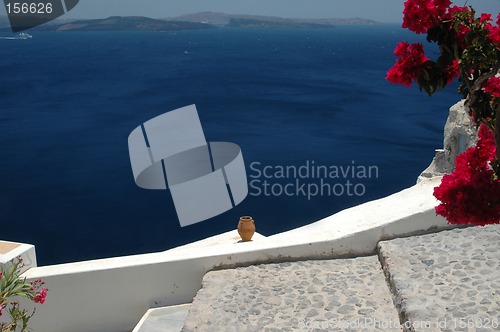 Image of ceramic vase over sea santorini