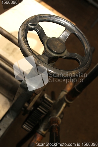 Image of old machine wheel