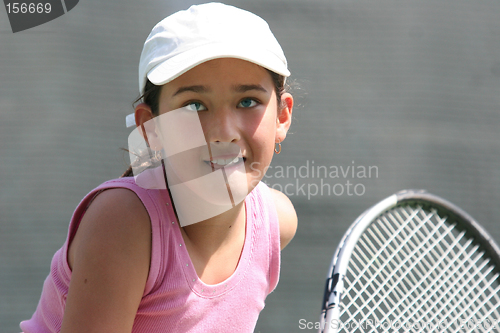 Image of Teenage girl on the tennis court