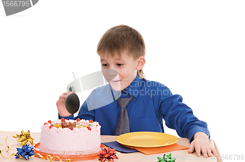 Image of boy with cake