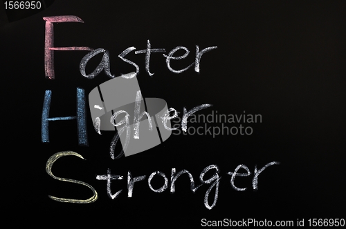Image of faster, higher, stronger on a blackboard