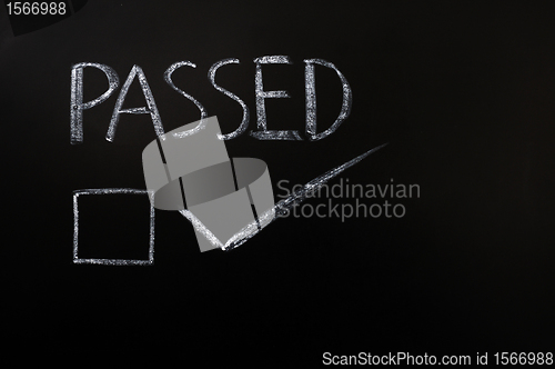 Image of Passed with a check box