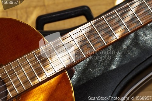 Image of guitar with case