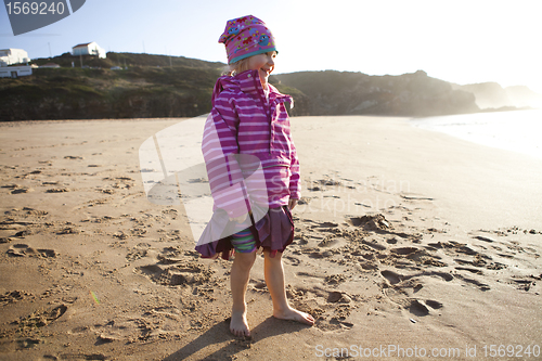 Image of Little girl on the beach