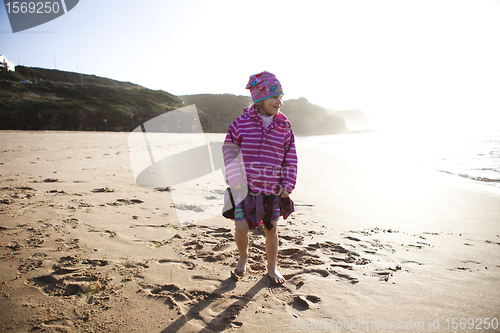 Image of Little girl on the beach