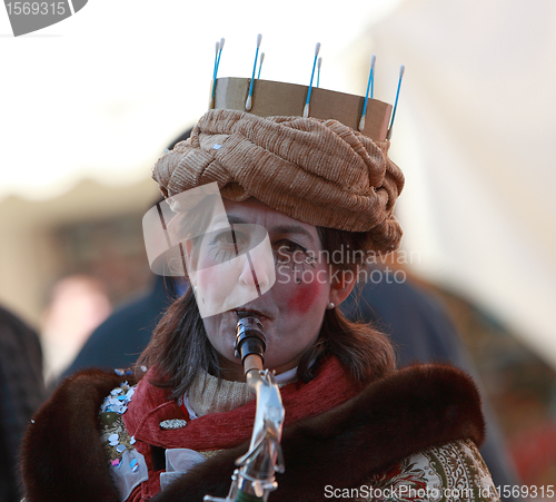 Image of Funny woman saxophonist