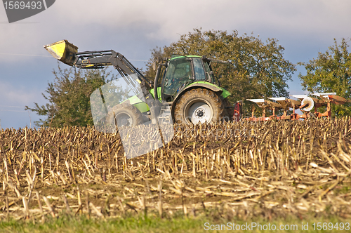 Image of agriculture machine with plow