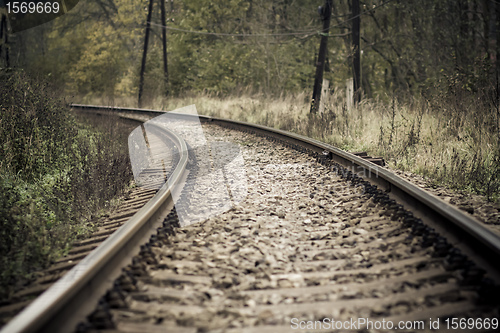 Image of railroad in autumn mystical weather